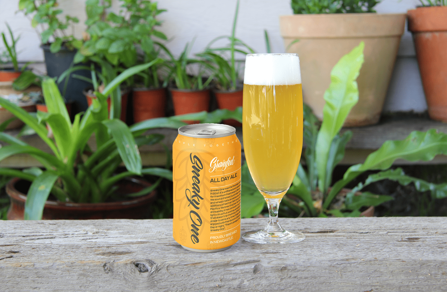 Grainfed_SneakyOne_can—brand_garden_beer_glass_2025 Grainfed_SneakyOne_can—brand_garden_beer_glass_2025